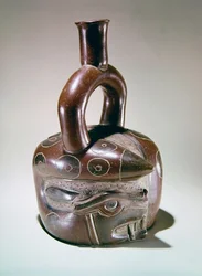 Painted and incised jar adorned with puma-headed snakes, from Sausal, Chicama Valley, Peru